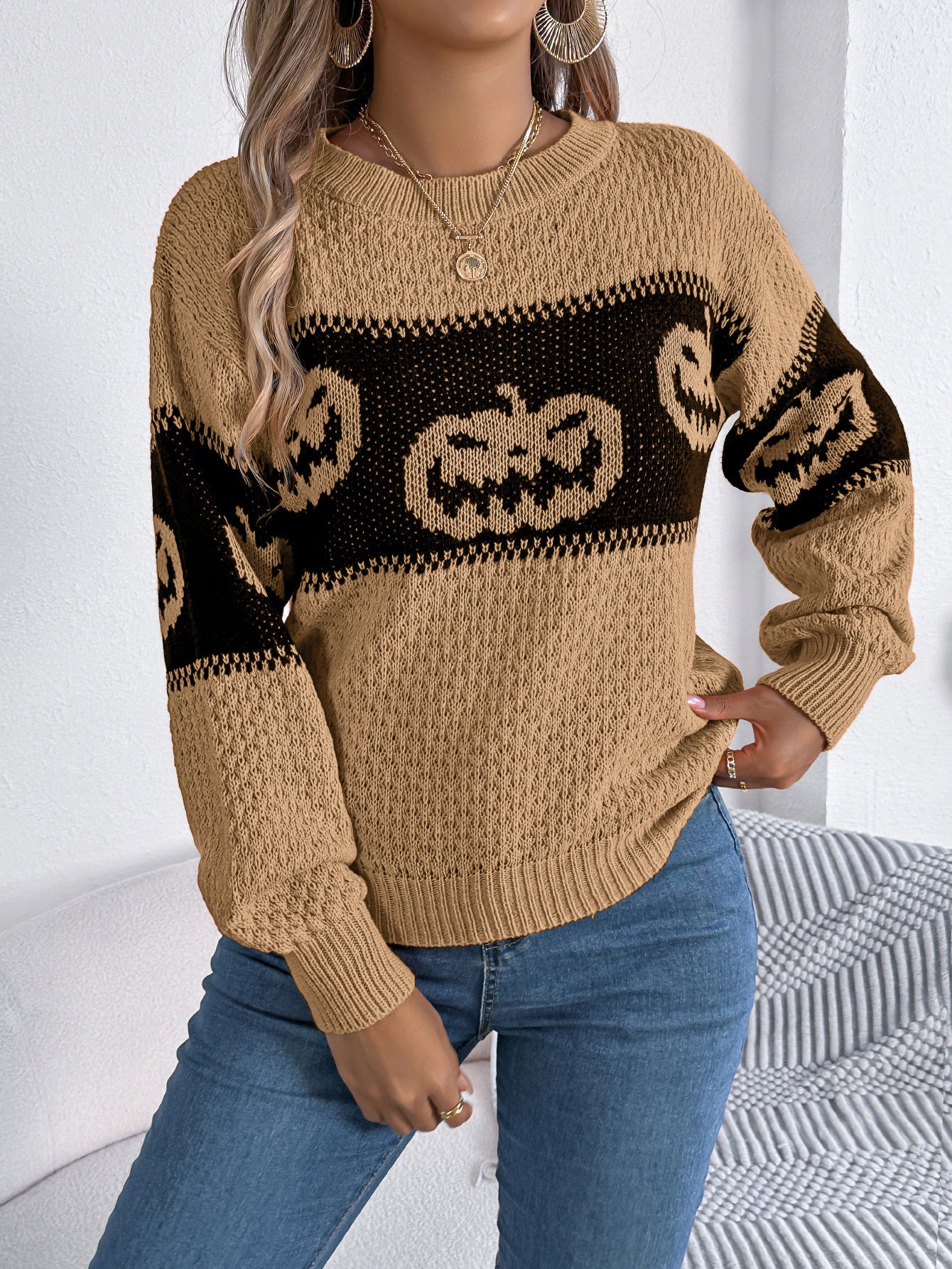 Halloween themed pumpkin head contrasting long sleeved pullover sweater